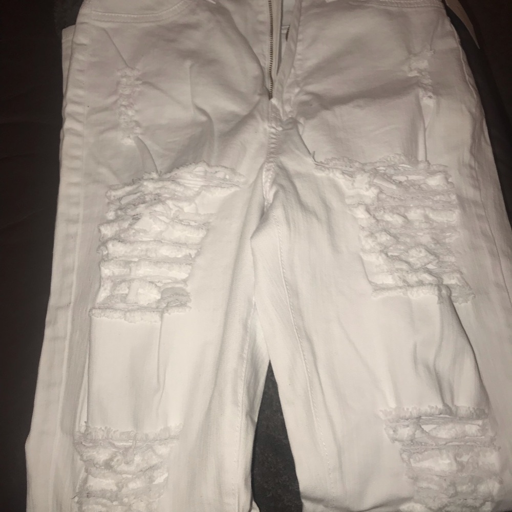 White ripped jeans